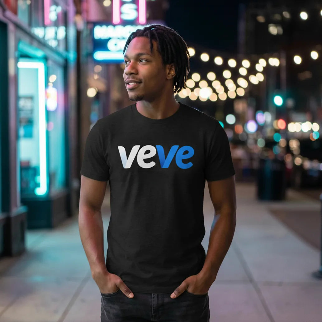 Common Club VeVe collector apparel — model in a black Digital Collectibles tee on an urban night street