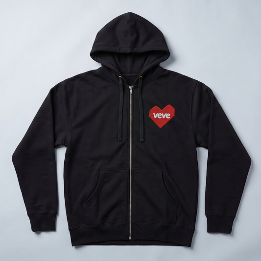 Common Club VeVe Collectors at Heart Zip Up Hoodie — black Independent Trading Co. SS4500Z full-zip hooded sweatshirt, lay-flat top-down view, red embroidered VeVe heart chest patch with white wordmark