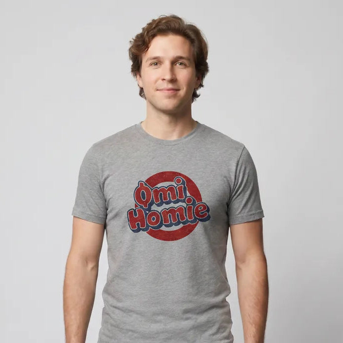 Omi Homie T-Shirt — ECOMI community tee in ash, modeled front view from Common Club
