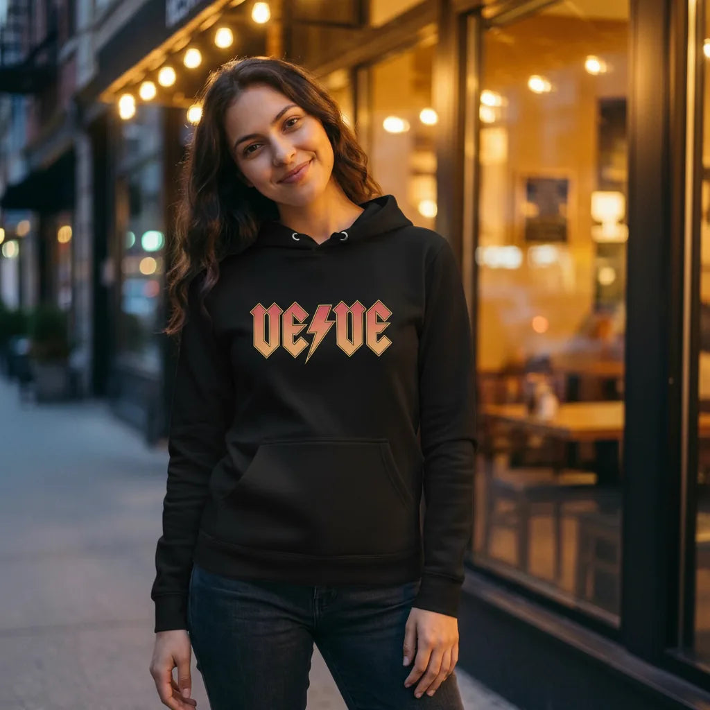 VeVe Classic Rock Premium Hoodie — fandom collecting hoodie from Common Club, modeled at night restaurant