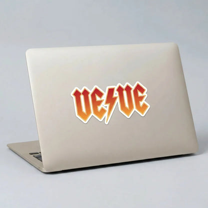 Veve Collectibles Classic Rock Logo Sticker — applied to unbranded laptop lid, lifestyle from Common Club