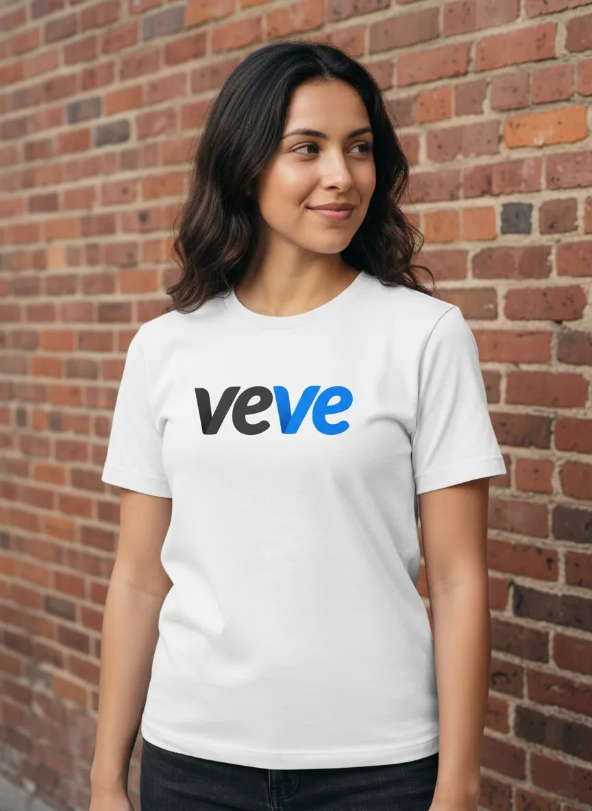 Veve Digital Collectibles Logo T-Shirt — VeVe classic logo tee in white, modeled at urban daytime wall