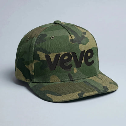 Veve Logo Camo Snapback Hat Black — front view from Common Club, VeVe logo embroidered on green camo flat-bill snapback