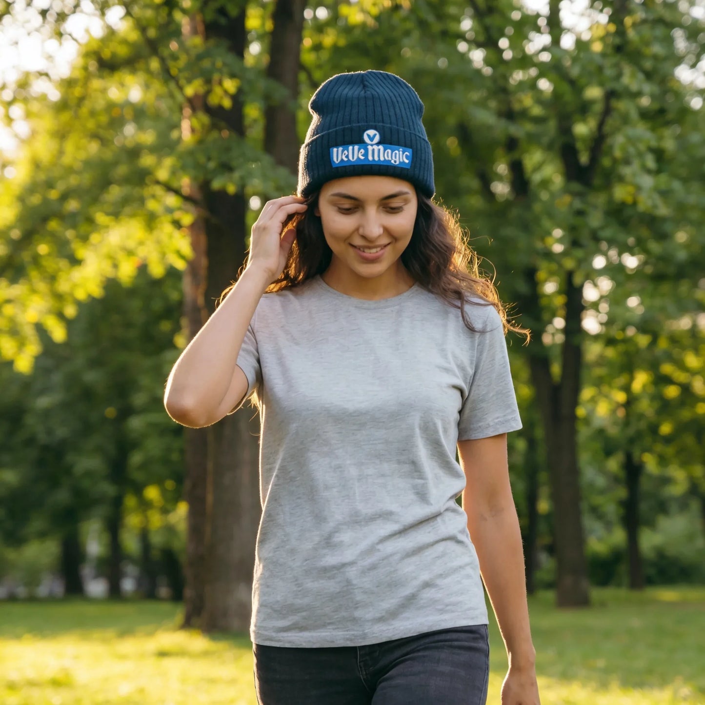 VeVe Magic Beanie — modeled at outdoor park, navy beanie with VeVe Magic embroidery worn naturally